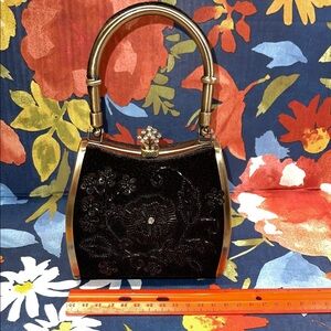 Chic Black Floral Clutch with Gold Accents